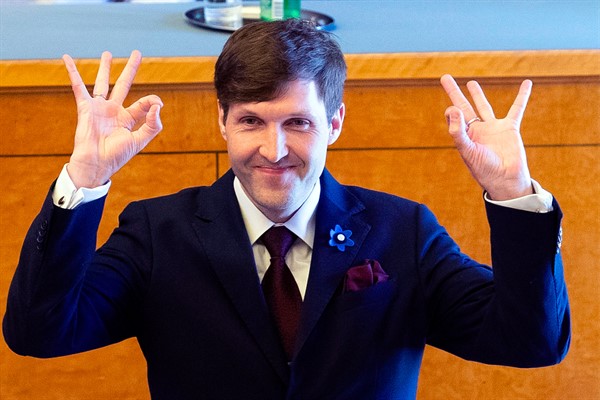 Martin Helme, head of the Estonian Conservative People’s Party, or EKRE, makes a hand gesture that is often associated with white supremacy at an event in Tallinn, Estonia, May 2, 2019 (Aripaev photo by Liis Treimann via AP Images).
