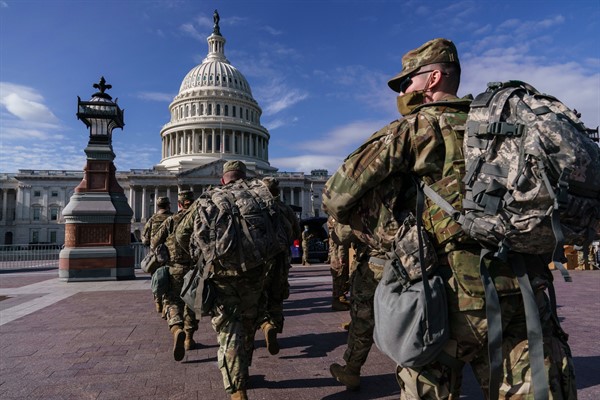 National Guard troops reinforce security around the U.S. Capitol ahead of Joe Biden’s inauguration, in Washington, Jan. 17, 2021 (AP photo by J. Scott Applewhite).