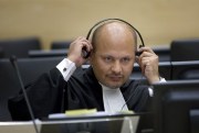 Karim Khan in the courtroom of the Special Court for Sierra Leone in The Hague, the Netherlands, June 4, 2007 (pool photo by Robert Vos via AP Images).