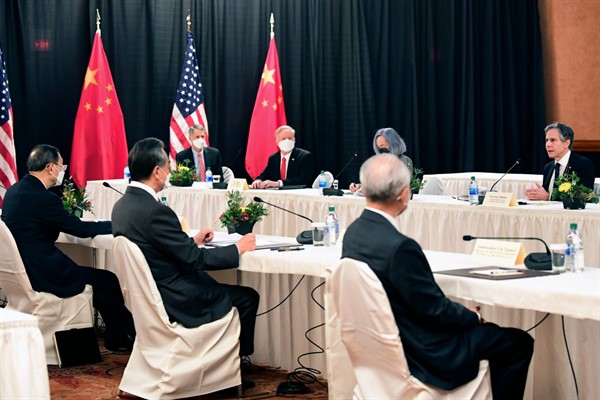 Secretary of State Antony Blinken, far right, speaks to China’s top diplomat, Yang Jiechi, left, and Foreign Minister Wang Yi, second from left, in Anchorage, Alaska, March 18, 2021 (pool photo by Frederic J. Brown via AP).