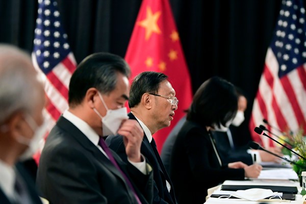 China’s top diplomat, Yang Jiechi, center, and foreign minister, Wang Yi, second from left, speak at the opening session of U.S.-China talks in Anchorage, Alaska, March 18, 2021 (pool photo by Frederic J. Brown via AP Images).