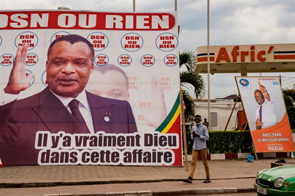 Election posters featuring opposition presidential candidate Guy Brice Parfait Kolelas, right, and President Denis Sassou N'Guesso, left, in Brazzaville, Congo, Friday March 12, 2021.