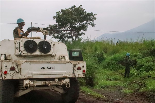 United Nations peacekeepers guard the area where a U.N. convoy was attacked in Nyiragongo, North Kivu province, Democratic Republic of Congo, Feb. 22, 2021 (AP photo by Justin Kabumba).