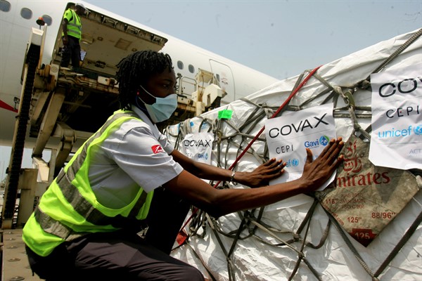 A shipment of COVID-19 vaccines distributed by the COVAX Facility arrives in Abidjan, Ivory Coast, Feb. 25, 2021 (AP photo by Diomande Ble Blonde).