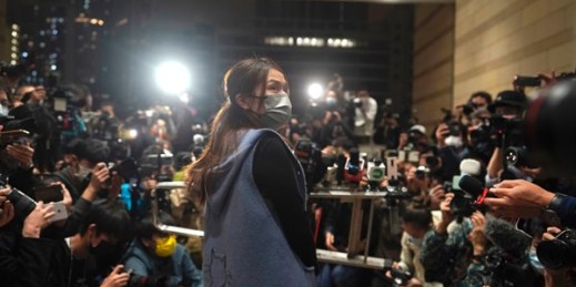 Clarisse Yeung, one of 47 pro-democracy advocates charged with “conspiracy to subvert state power,” speaks to the media after being released on bail at a court in Hong Kong, March 5, 2021 (AP photo by Kin Cheung).
