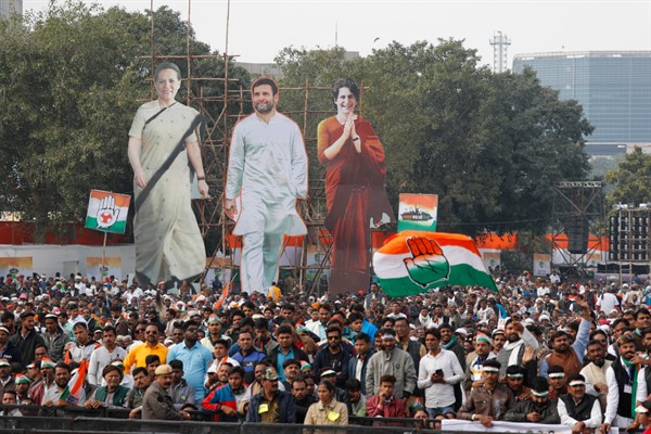 Supporters of India’s main opposition party protest Narendra Modi’s government in front of huge cut-outs of their leaders, Sonia Gandhi, Rahul Gandhi and Priyanka Gandhi, in New Delhi, Dec. 14, 2019 (AP photo by Manish Swarup).