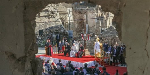 Pope Francis, surrounded by shells of destroyed churches, attends a prayer for the victims of war at Hosh al-Bieaa Church Square, in Mosul, Iraq, March 7, 2021 (AP photo by Andrew Medichini).