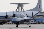 A Predator B unmanned aircraft taxis at the Naval Air Station in Corpus Christi, Texas, Nov. 8, 2011 (AP photo by Eric Gay).
