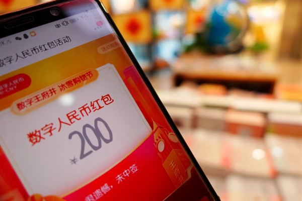 A mobile phone screen showing the drawing of the red packets of the digital currency issued by China’s central bank, in Beijing, China, Feb. 16, 2021 (Photo by Jason Fan for FeatureChina via AP Images).