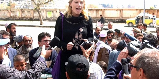 Marla Ruzicka leads a demonstration calling for U.S. compensation to victims of the U.S. led military campaign in Afghanistan, outside of the U.S. Embassy in Kabul, April 7, 2002 (AP photo by Suzanne Plunkett).