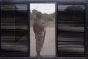 A Mozambican soldier provides security prior to the arrival of Indian Prime Minister Narendra Modi at a technical school in Maluana, Mozambique, July 7, 2016 (AP photo by Schalk van Zuydam).