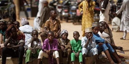 Young Muslim boys wait for traditional Friday prayers to begin at a mosque in Kano, northern Nigeria, Feb. 15, 2019 (AP photo by Ben Curtis).