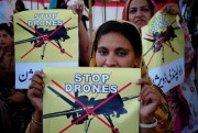 A supporter of the political party Pakistan Tehreek-e-Insaf, or Movement of Justice, takes part in a rally against the U.S. drone strikes in Pakistani tribal areas, in Peshawar, Pakistan, April 23, 2011 (AP photo by Mohammad Sajjad).