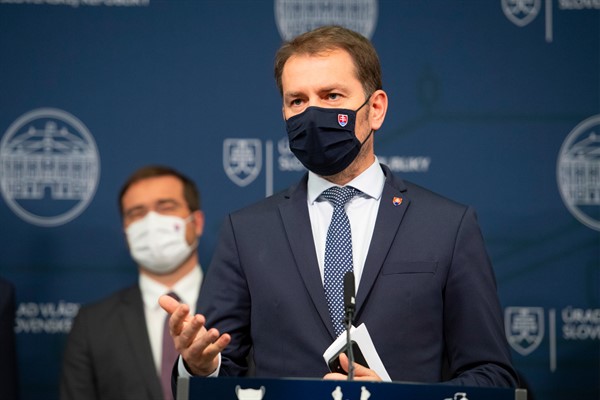 Then-Prime Minister Igor Matovic announces the resignation of Health Minister Marek Krajci, left, in Bratislava, Slovakia, March 11, 2021 (TASR photo by Pavel Neubauer via AP).