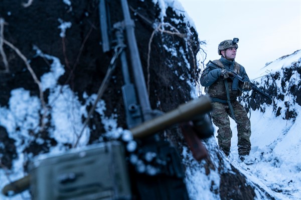 A Ukrainian serviceman guards his position near the Line of Contact near Vodiane, 468 miles southeast of Kyiv, eastern Ukraine, Saturday, March 6, 2021 (AP photo by Evgeniy Maloletka).