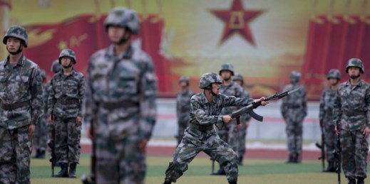 Chinese People’s Liberation Army cadets take part in bayonet drills at the PLA’s Armored Forces Engineering Academy Base, on the outskirts of Beijing, China, July 22, 2014 (AP photo by Andy Wong).