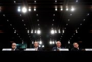 Acting FBI Director Andrew McCabe, Deputy Attorney General Rod Rosenstein, National Intelligence Director Dan Coats, and NSA Director Adm. Michael Rogers at a Senate hearing in Washington, June 7, 2017 (AP photo by Carolyn Kaster).