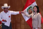 Presidential candidates Pedro Castillo, left, and Keiko Fujimori at an event in Lima, Peru, May 17, 2021 (AP photo by Martin Mejia).