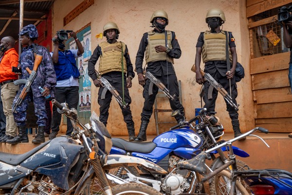 Soldiers stand outside a polling station in Kampala, Uganda, Jan. 14, 2021 (AP photo by Jerome Delay).