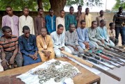 A group of men identified by Nigerian police as Boko Haram extremists in Maiduguri, Nigeria, July 18, 2018 (AP photo by Jossy Ola).