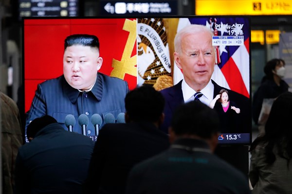 A TV news program showing an image of North Korean leader Kim Jong Un and U.S. President Joe Biden, at the Suseo Railway Station in Seoul, South Korea, March 26, 2021 (AP photo by Ahn Young-joon).