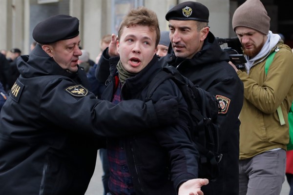 Belarusian police detain journalist and activist Roman Protasevich, center, in Minsk, Belarus, March 26, 2017 (AP photo by Sergei Grits).