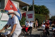 People take part in a protest of the U.S. embargo against Cuba, Santa Clara, Cuba, April 25, 2021 (AP photo by Ismael Francisco).