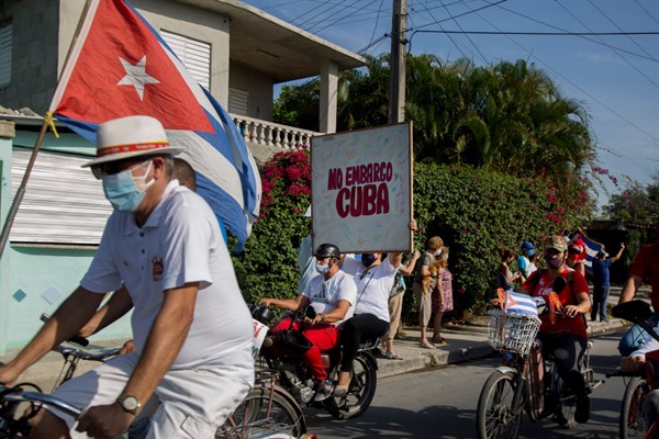 People take part in a protest of the U.S. embargo against Cuba, Santa Clara, Cuba, April 25, 2021 (AP photo by Ismael Francisco).