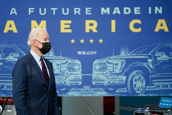 President Joe Biden listens during a tour of the Ford Rouge EV Center in Dearborn, Mich., May 18, 2021 (AP photo by Evan Vucci).