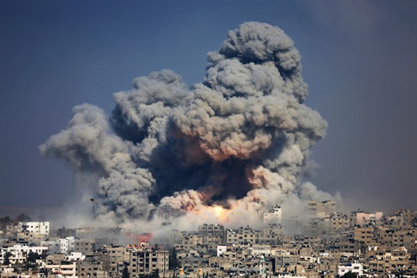 Smoke and fire from an Israeli strike rise over Gaza City, July 29, 2014 (AP photo by Hatem Moussa).