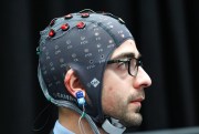 A man sends brain-computer interface commands to a robotic computer during Science Conference at the Convention Center in Washington, D.C., Feb. 17, 2011 (AP photo by Jose Luis Magan).