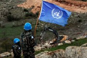 U.N. peacekeepers observe Israeli excavators working near Mays al-Jabal, Lebanon, Dec. 13, 2018 (AP photo by Hussein Malla).