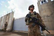 A U.S. soldier stands guard at the K1 Air Base near Kirkuk in northern Iraq, March 29, 2020 (Photo by Ameer Al Mohammedaw for dpa via AP Images).