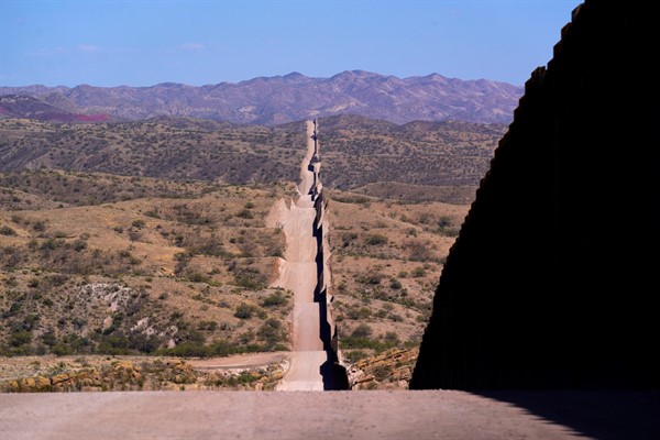 A new border wall stretches along the landscape near Sasabe, Arizona, May 19, 2021 (AP photo by Ross D. Franklin).