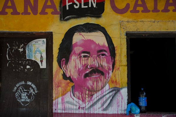 A defaced mural of Nicaraguan President Daniel Ortega in Catarina, Nicaragua, May 7, 2018 (AP photo by Moises Castillo).