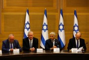 From the left, Avigdor Lieberman, Benny Gantz, Yair Lapid and Israel’s new prime minister, Naftali Bennett, hold a first Cabinet meeting, in Jerusalem, June 13, 2021 (AP photo by Ariel Schalit).