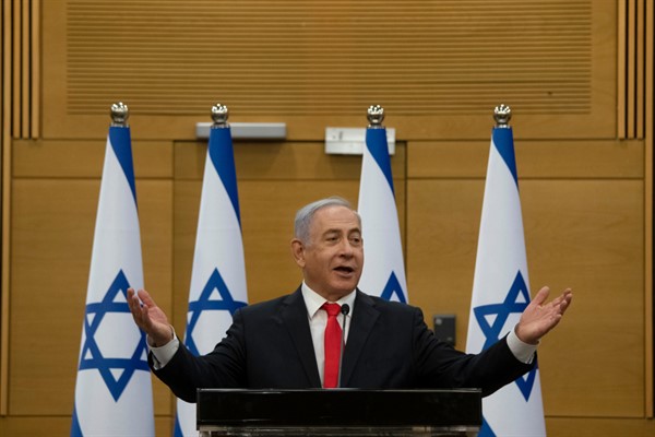 Former Israeli Prime Minister Benjamin Netanyahu speaks to right-wing opposition party members a day after a new government was sworn in, at the Knesset, Israel’s parliament, in Jerusalem, June 14, 2021 (AP photo by Maya Alleruzzo).