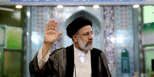Ebrahim Raisi, a candidate in Iran’s presidential elections, waves to the media after casting his vote at a polling station in Tehran, Iran June 18, 2021 (AP photo by Ebrahim Noroozi).