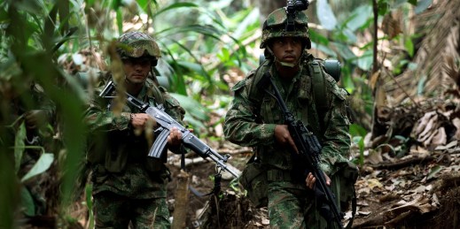 Soldiers patrol during a military operation in Macarena, southern Colombia
