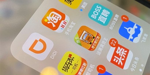 The ride-hailing app Didi and other Chinese apps on a phone in Beijing, July 5, 2021 (AP photo by Ng Han Guan).