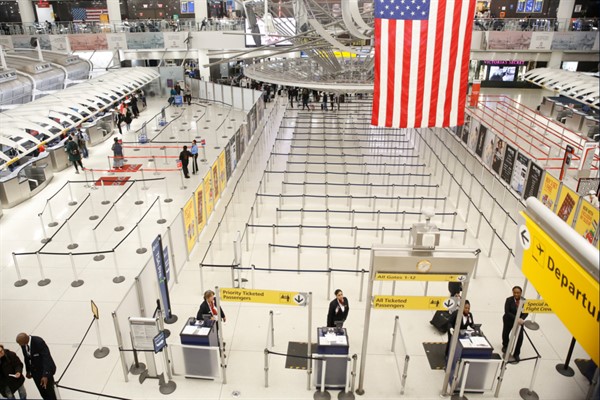The empty area for TSA screening of travelers at the John F. Kennedy airport's Terminal 1 in New York, March 13, 2020 (AP photo by Kathy Willens).