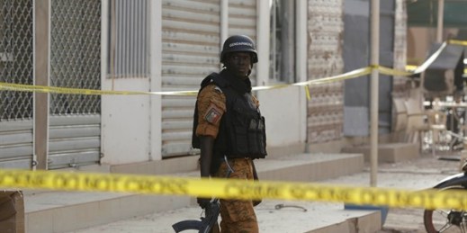 A soldier stand guards outside the site of an attack in Ouagadougou, Burkina Faso, Jan. 16, 2016 (AP photo by Sunday Alamba).
