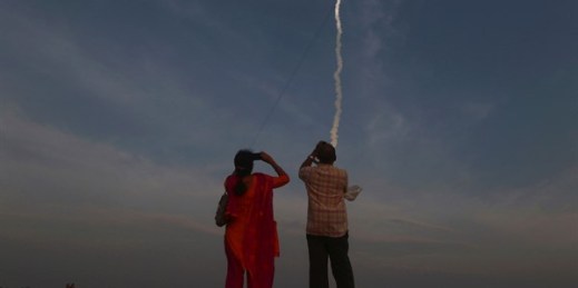 Indians watch a rocket carrying communication satellite GSAT-29 lift off from Satish Dhawan Space Center in Sriharikota, India, Nov. 14, 2018 (AP Photo/R. Parthibhan).