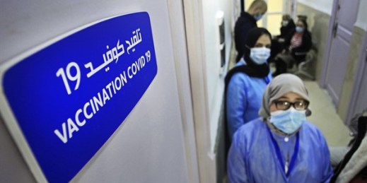 Nurses wait in the corridor of a vaccination center where Algerians get the COVID-19 vaccine, Algiers, Feb.3, 2021 (AP photo by Fateh Guidoum).