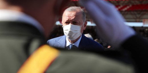 Turkish President Recep Tayyip Erdogan during a military parade, in Nicosia, Cyprus, July 20, 2021 (Turkish Presidency pool photo via AP Images).