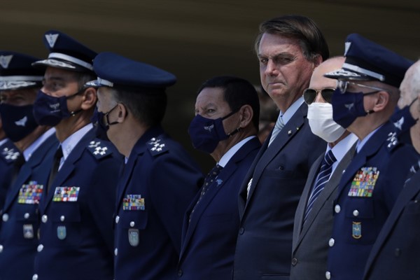 Brazilian President Jair Bolsonaro attends a ceremony to commemorate the 80th anniversary of the Air Force at the Air Base headquarters in Brasilia, Brazil, Jan. 20, 2021 (AP photo by Eraldo Peres).