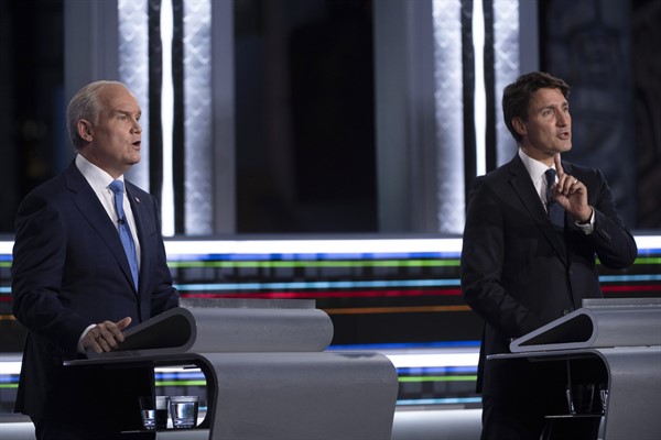 Canadian Prime Minister Justin Trudeau, right, and Conservative Party leader Erin O’Toole take part in a televised debate, in Gatineau, Quebec, Sept. 8, 2021 (Justin Tang/The Canadian Press via AP),