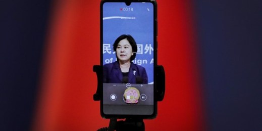 A smartphone records Chinese Foreign Ministry spokeswoman Hua Chunying as she speaks during a daily briefing at the Ministry of Foreign Affairs in Beijing, Sept. 1, 2020 (AP photo by Andy Wong).
