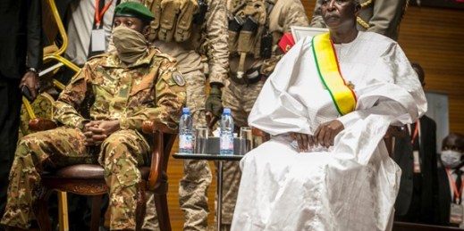 Col. Assimi Goita, left, head of Mali’s military junta, and retired Col. Maj. Bah N’Daw, right, as N’Daw is sworn into the office of transitional president, Bamako, Mali, Sept. 25, 2020 (AP file photo).