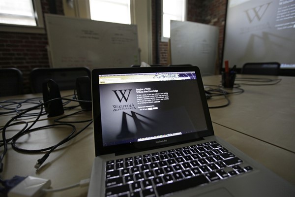 A Wikipedia landing page is displayed on a laptop computer screen at the offices of the Wikipedia Foundation in San Francisco, Jan. 18, 2012 (AP photo by Eric Risberg).